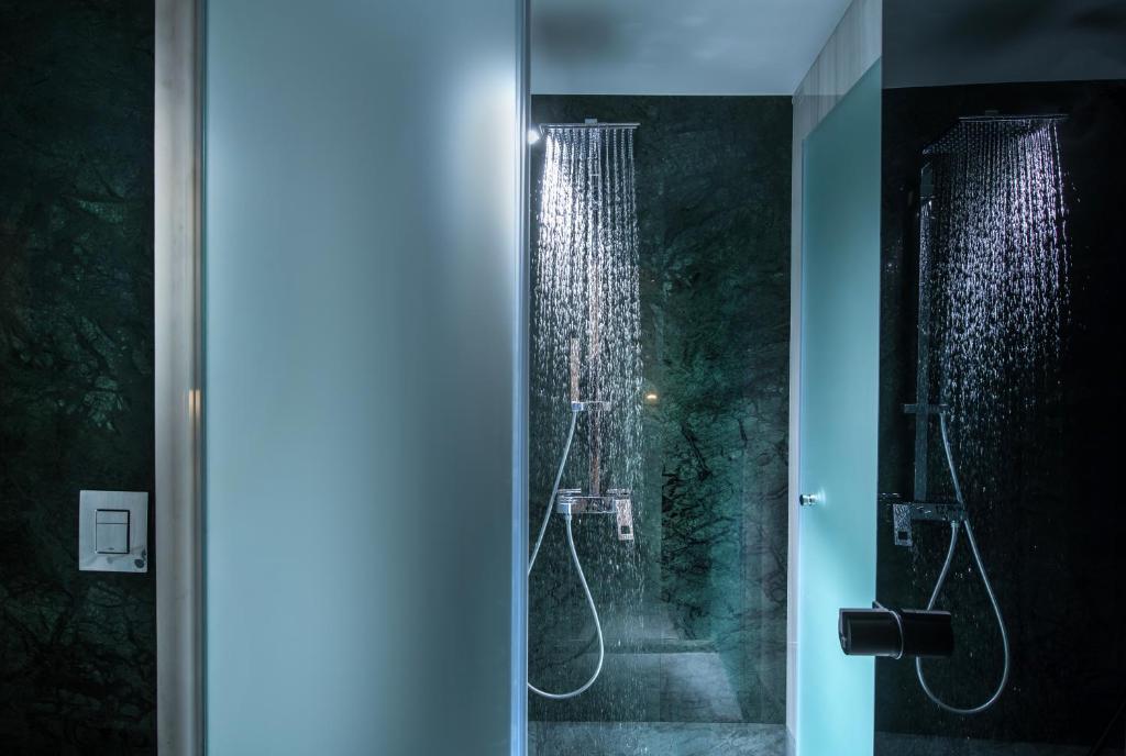 Koupelna v ubytování Dimargio Luxury Hotel & Spa