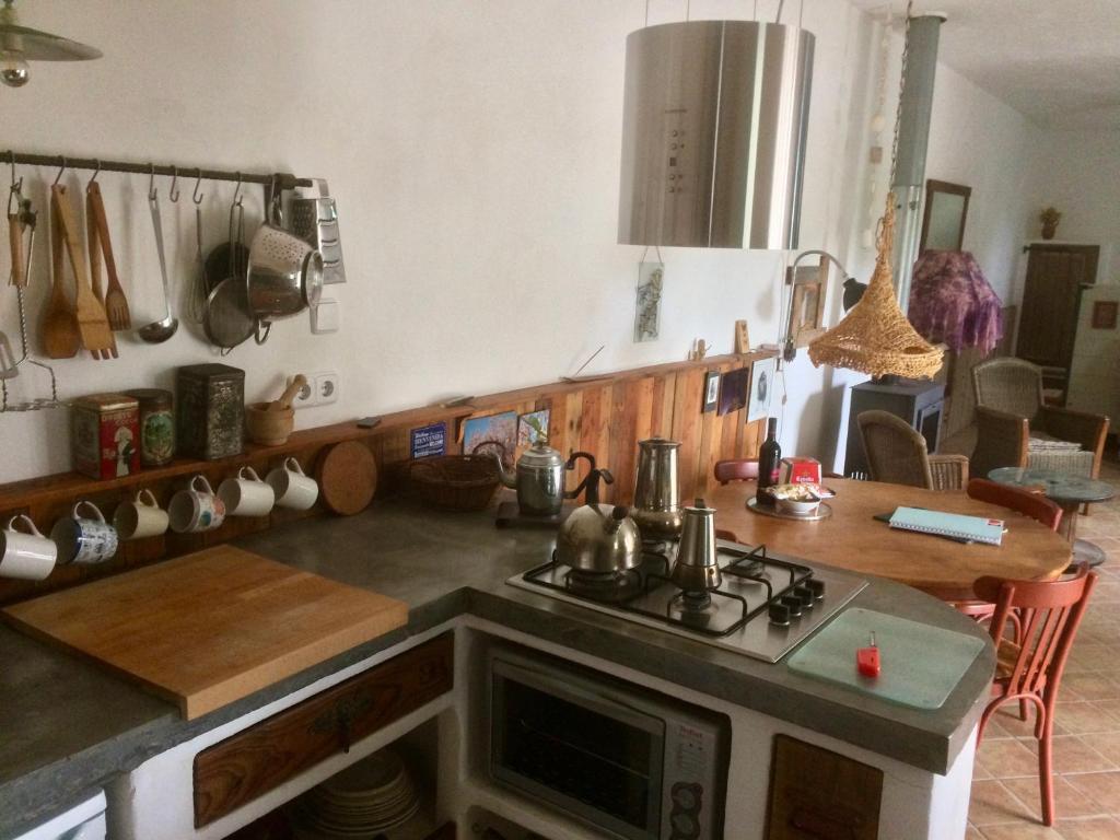 Kuchyň nebo kuchyňský kout v ubytování Casalado