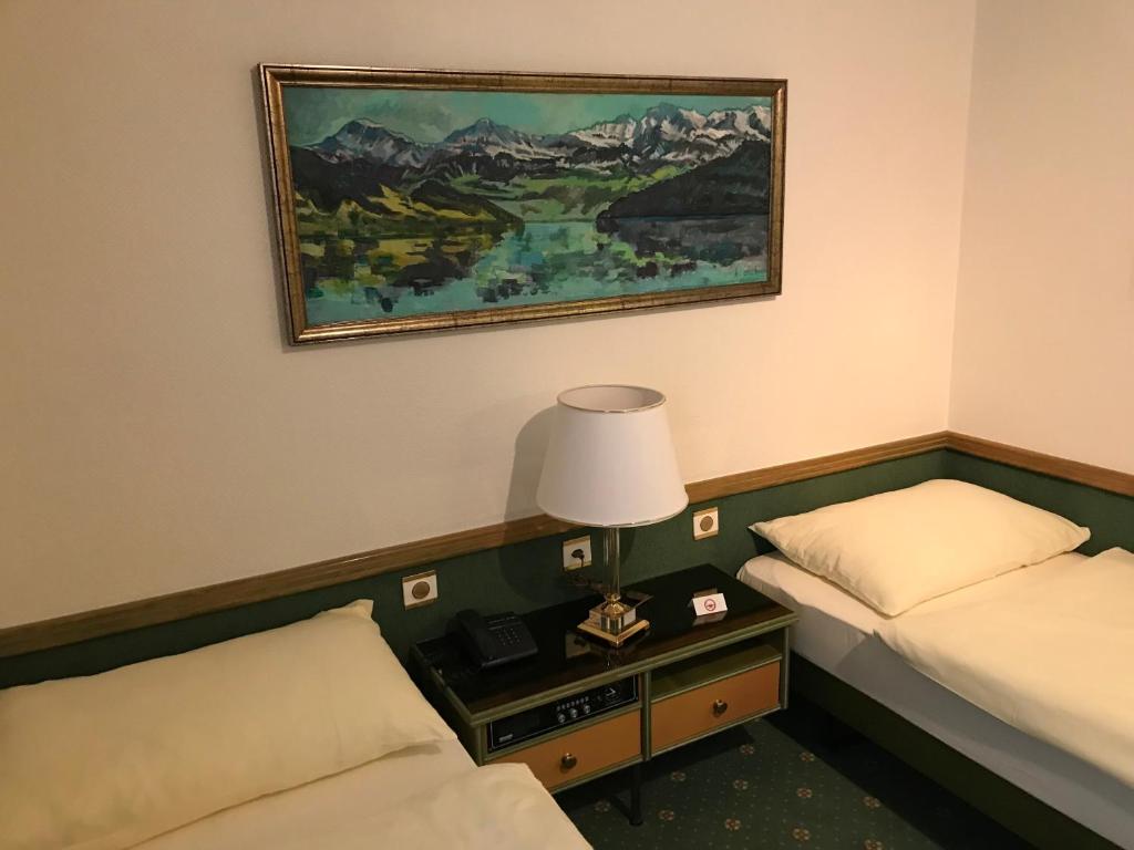 Cama o camas de una habitación en Hotel Arlette Beim Hauptbahnhof