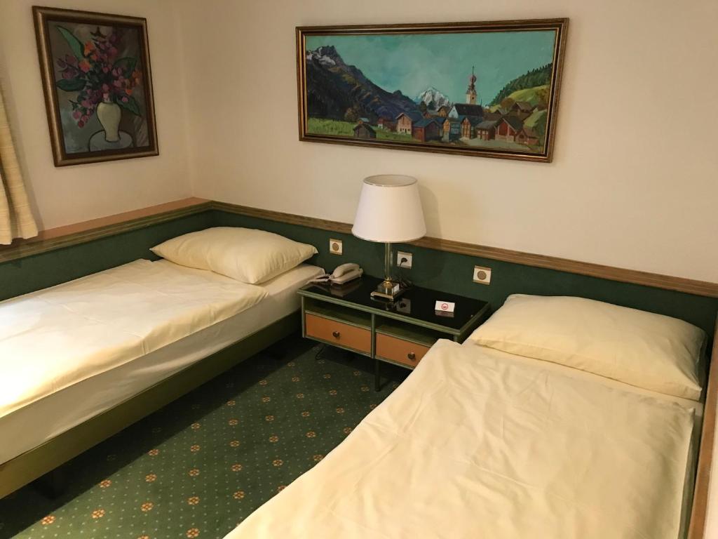 Cama o camas de una habitación en Hotel Arlette Beim Hauptbahnhof