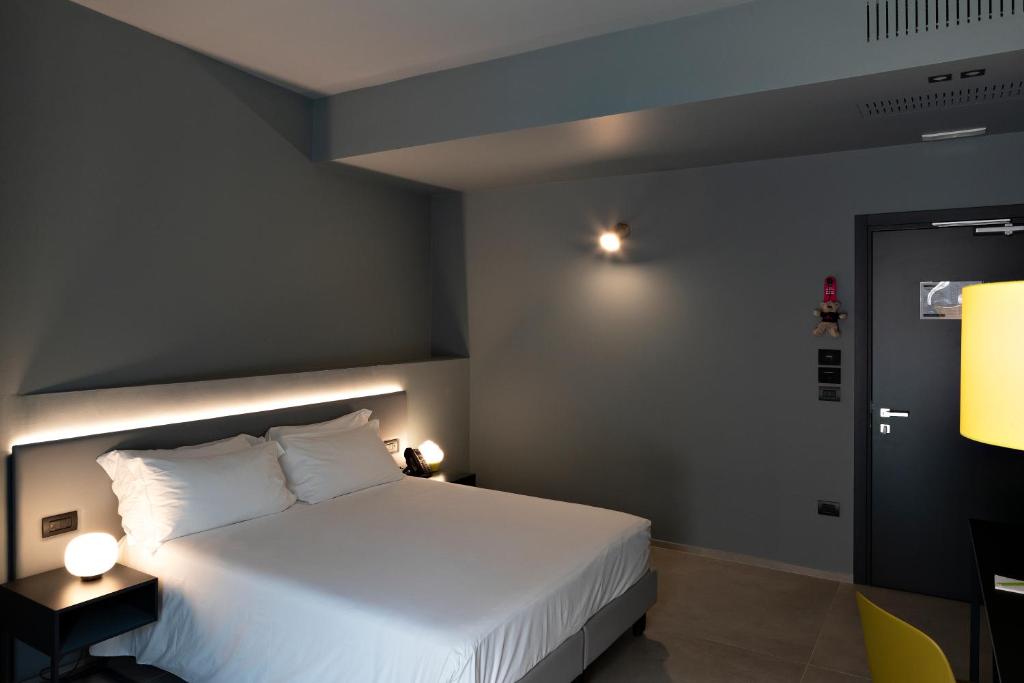 Arryvo Hotelにあるベッド