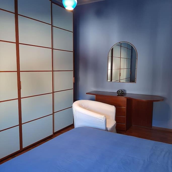 A bed or beds in a room at MìCè ottima soluzione per il centro e la Svizzera