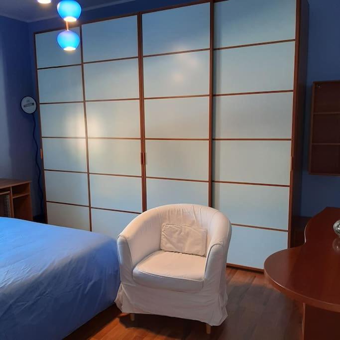 A bed or beds in a room at MìCè ottima soluzione per il centro e la Svizzera