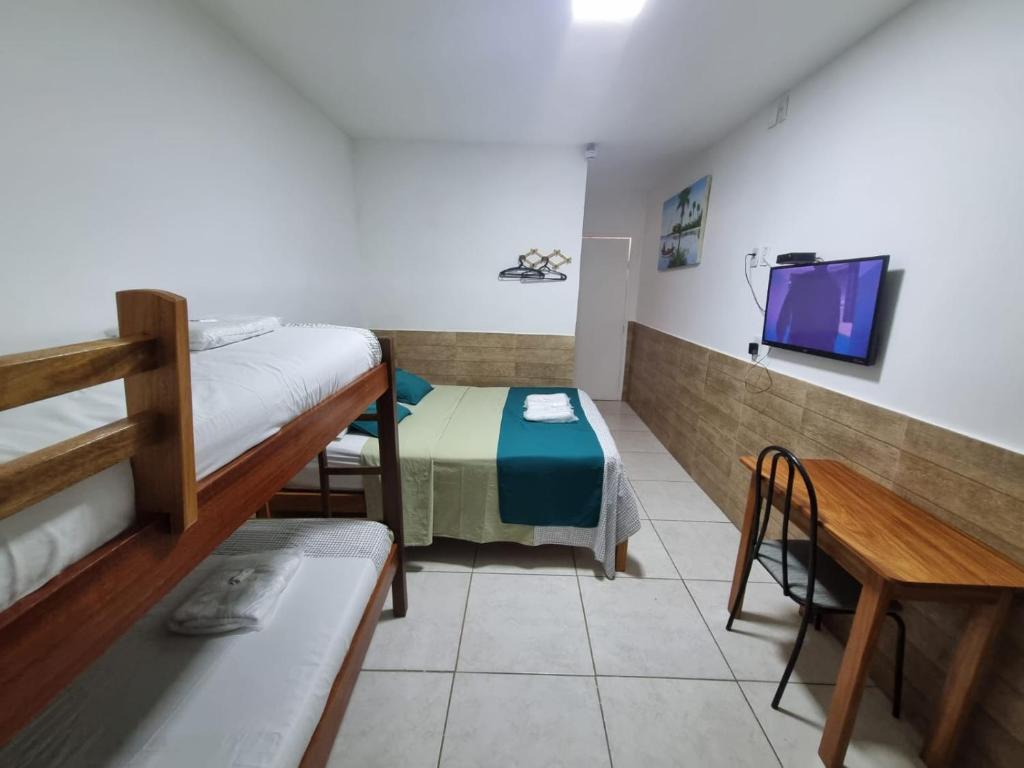 Postel nebo postele na pokoji v ubytování Pousada Águas Douradas