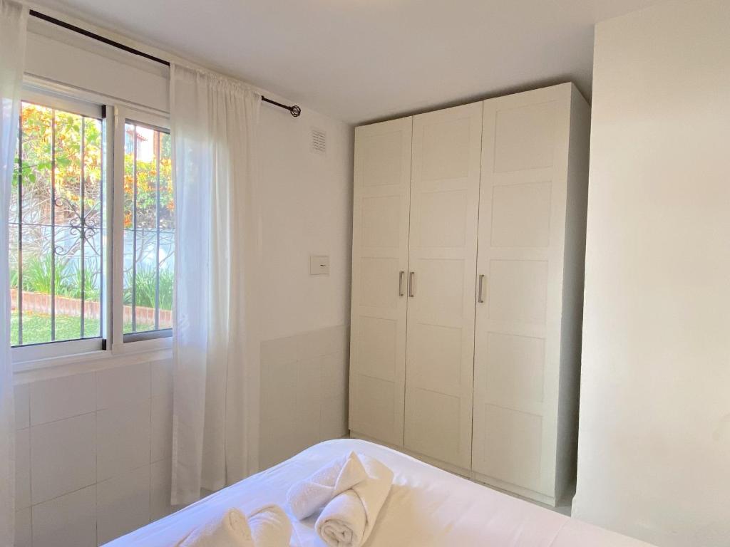 Posteľ alebo postele v izbe v ubytovaní Villa Sandra Al Fresco Apartment