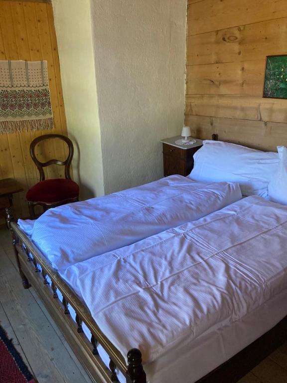 Postel nebo postele na pokoji v ubytování Berghotel Gasterntal