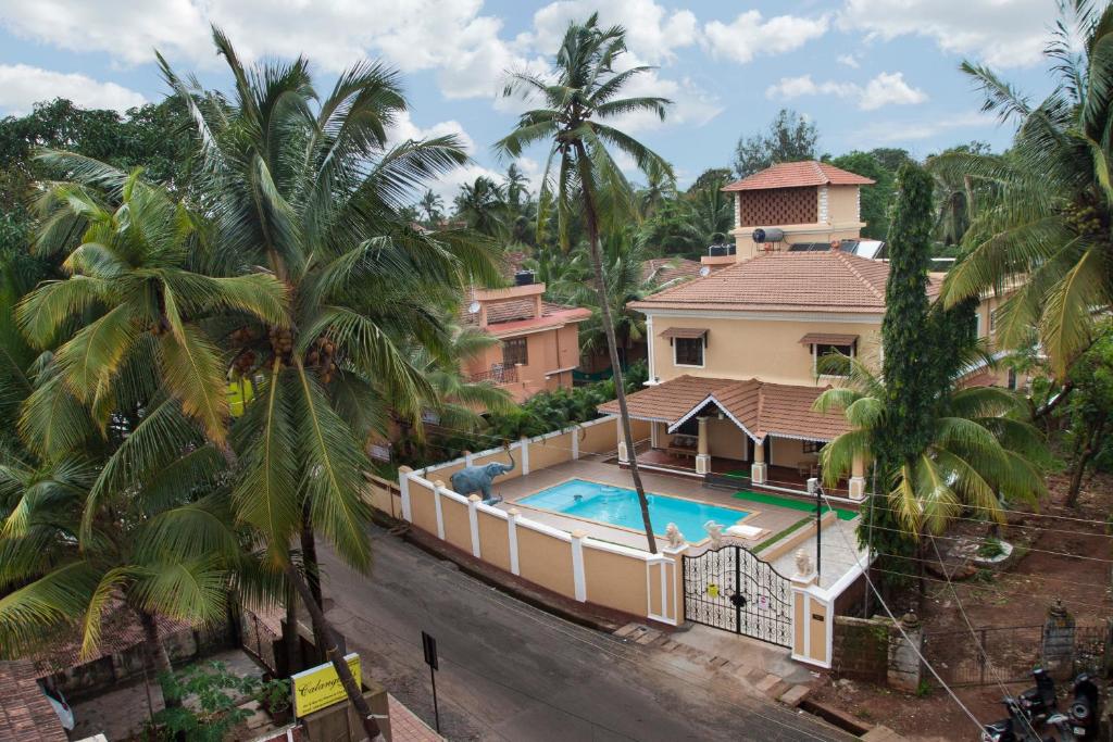 an aerial view of a house with a swimming pool at Lavish Executive Villa with Private Swimming Pool in Calangute
