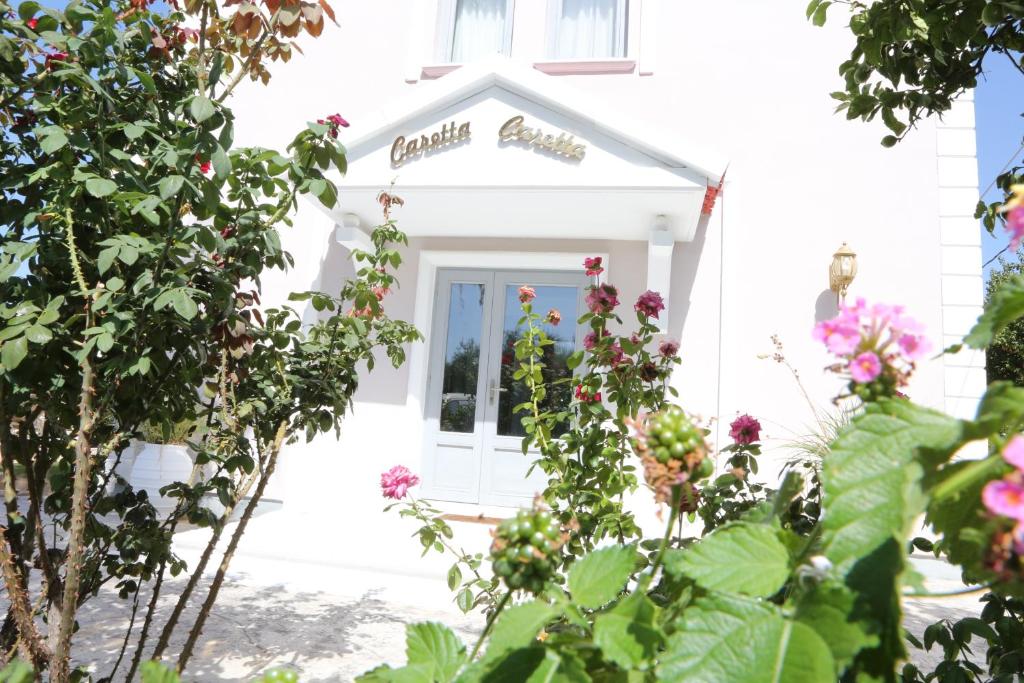 Zahrada ubytování Caretta - Caretta Hotel