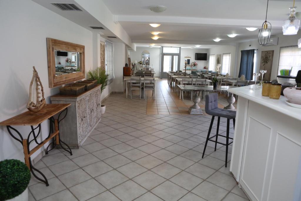 Restaurace v ubytování Caretta - Caretta Hotel