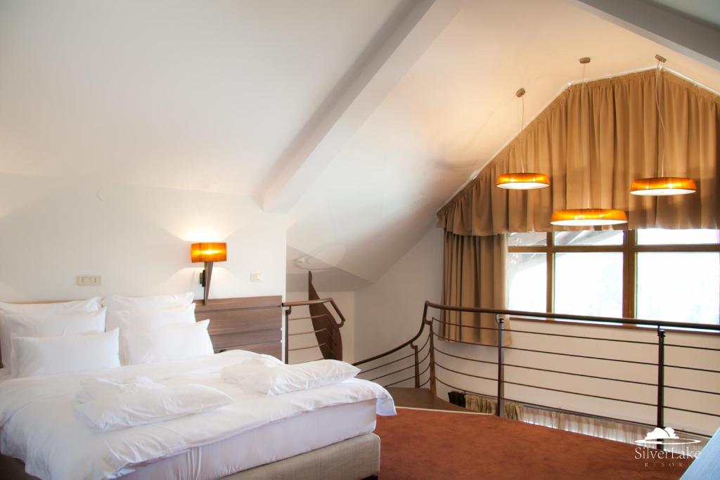 Una cama o camas en una habitación de Hotel Danubia Park