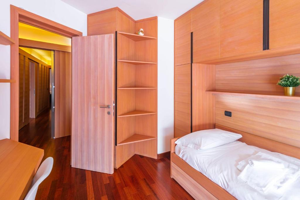 Posteľ alebo postele v izbe v ubytovaní Terrazza su Sestriere Lux