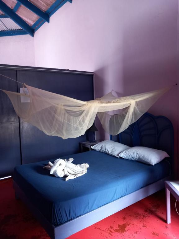 Postel nebo postele na pokoji v ubytování Il Triangolo Hostel
