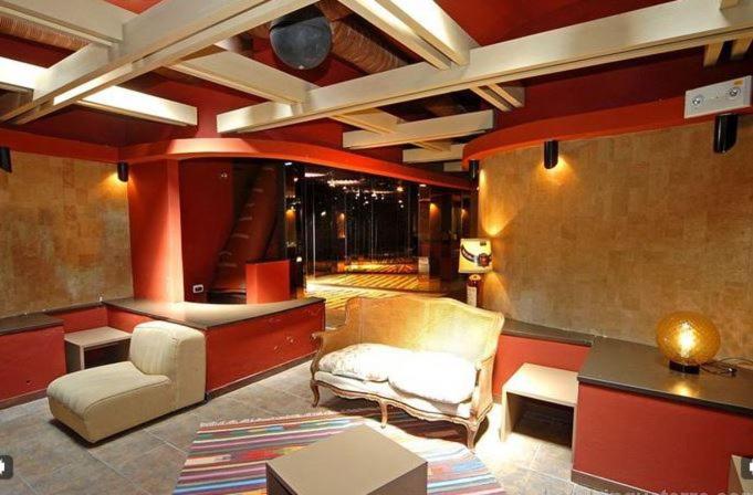 A seating area at Fegina 3 DELuxe Bedrooms & Bathrooms