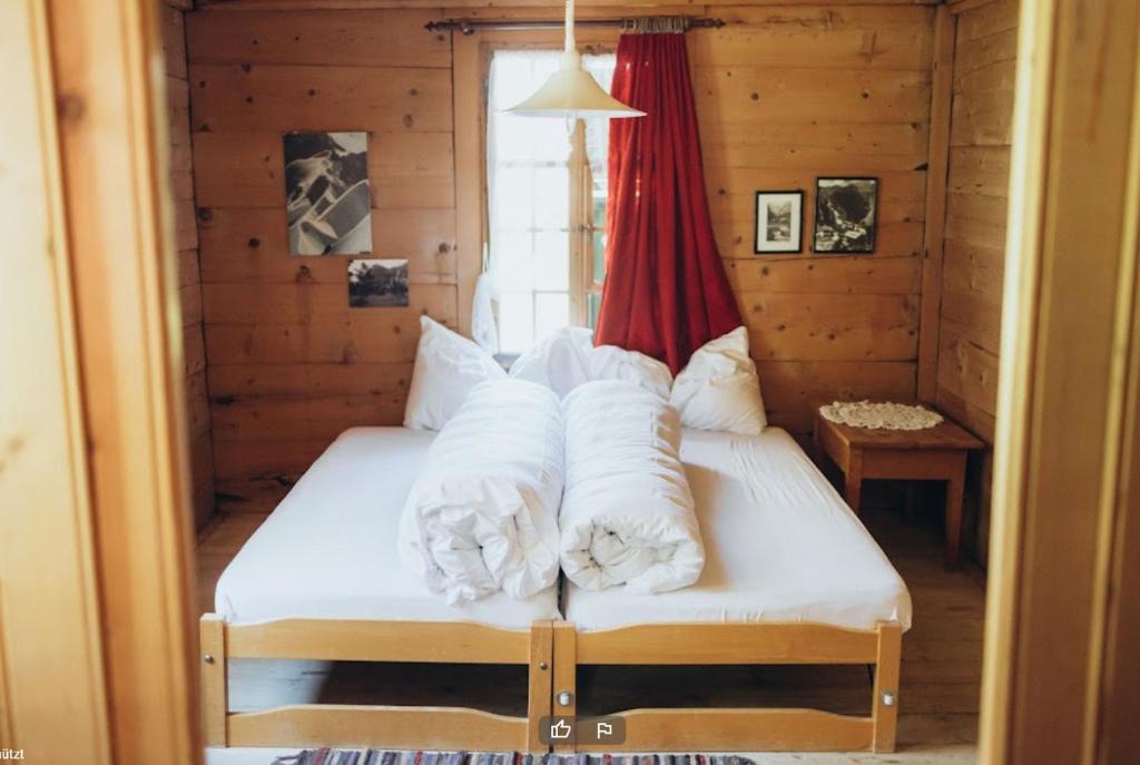 Postel nebo postele na pokoji v ubytování Berghotel Gasterntal