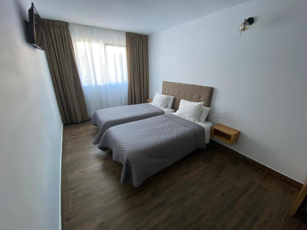 Postel nebo postele na pokoji v ubytování El Patio Hostal
