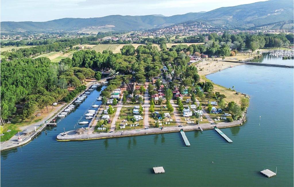 an aerial view of a marina with boats in the water at Pet Friendly Stacaravan in Tuoro sul Trasimeno