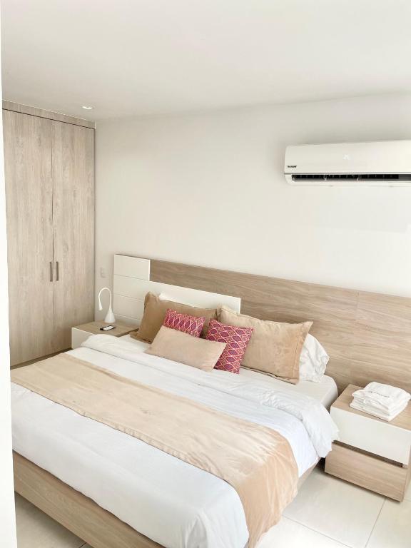 Postel nebo postele na pokoji v ubytování Apartamentos Loft Mikonos