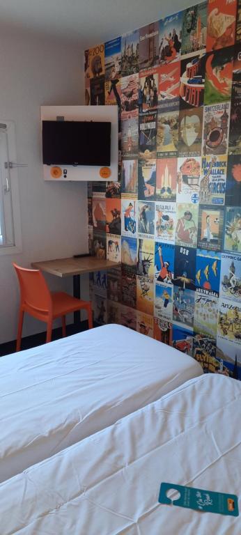 Postel nebo postele na pokoji v ubytování hotelF1 Compiègne