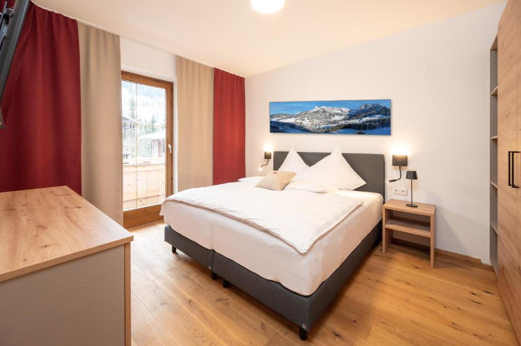 Postel nebo postele na pokoji v ubytování Kuckuck Hinterthal - Appartements