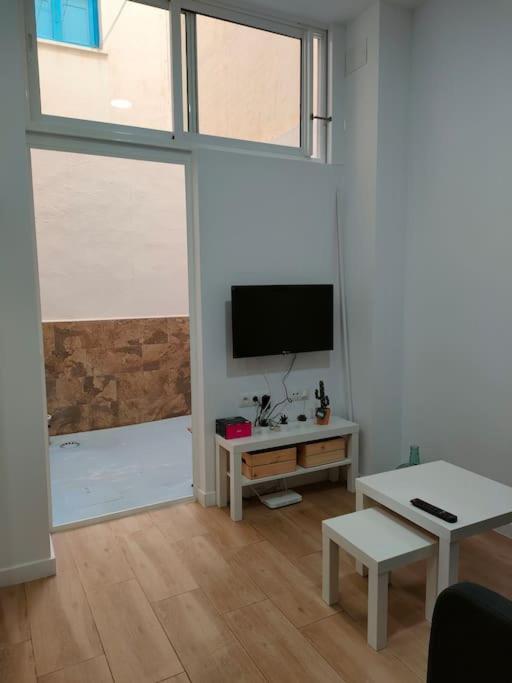 Televízia a/alebo spoločenská miestnosť v ubytovaní Estudio céntrico ARQ