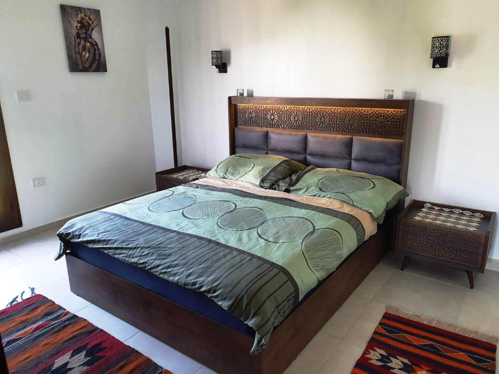 Postel nebo postele na pokoji v ubytování CASA LOKO Guest House