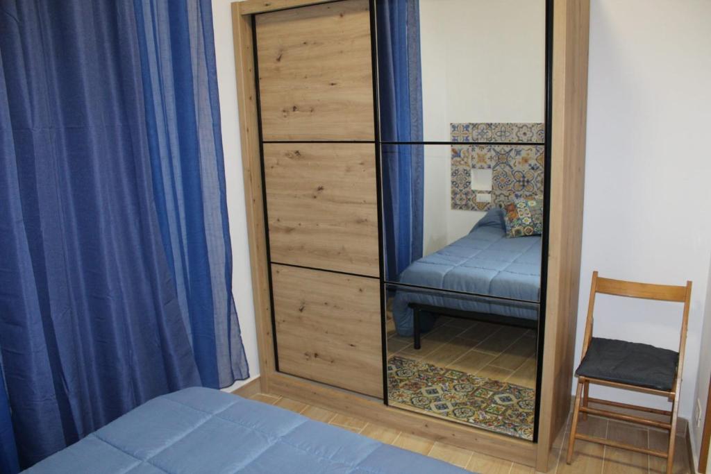Postel nebo postele na pokoji v ubytování LA CASA DI MARTINA