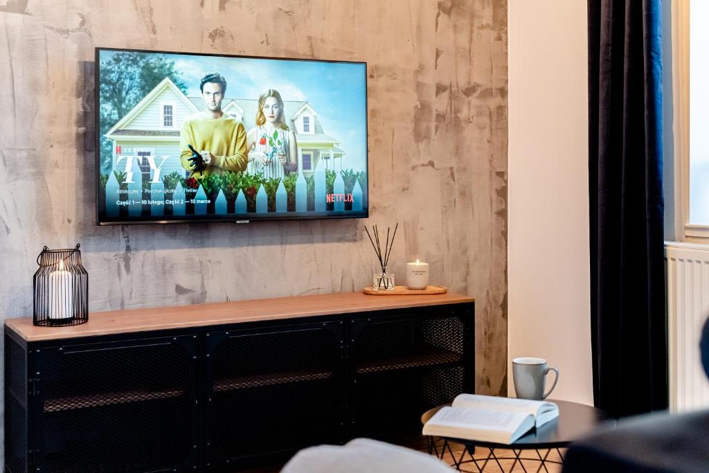 Telewizja i/lub zestaw kina domowego w obiekcie Ottimo Apartamenty Jagiellońska