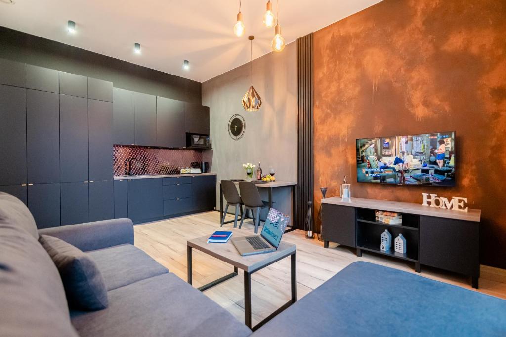 Telewizja i/lub zestaw kina domowego w obiekcie Ottimo Apartamenty Jagiellońska