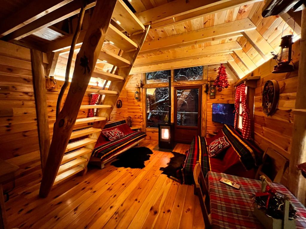 Postel nebo postele na pokoji v ubytování Tree house - Tara Place