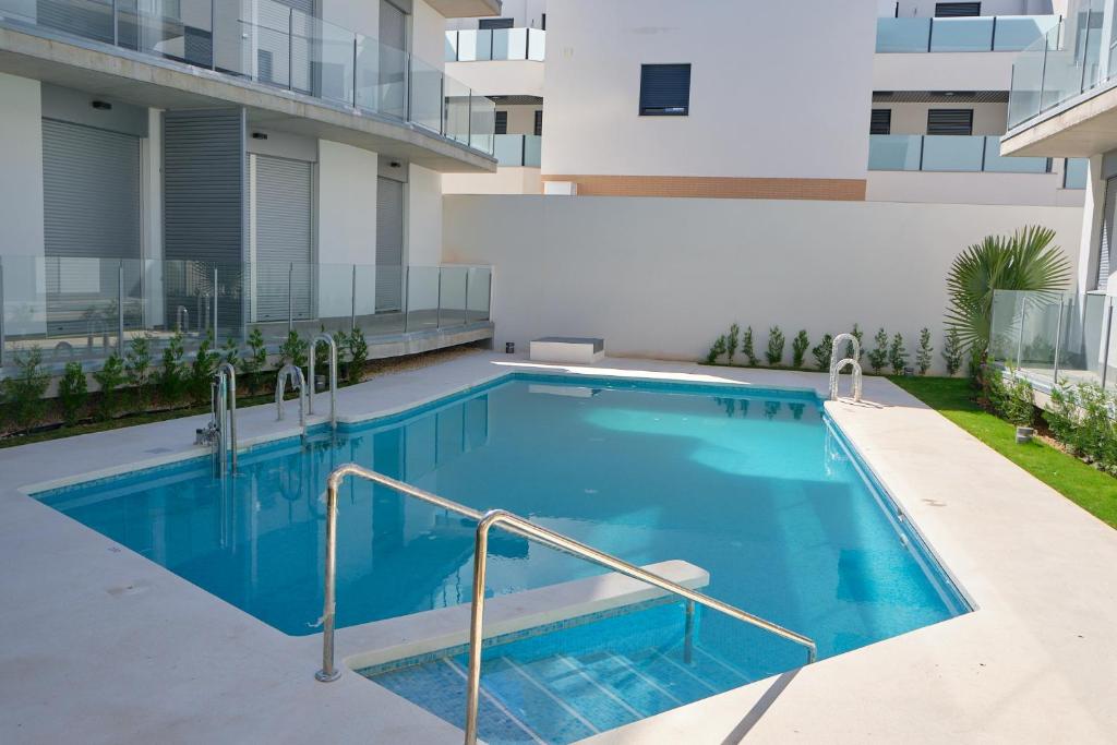 Bazén v ubytování Viento Grande, Apartamento boutique en la playa nebo v jeho okolí