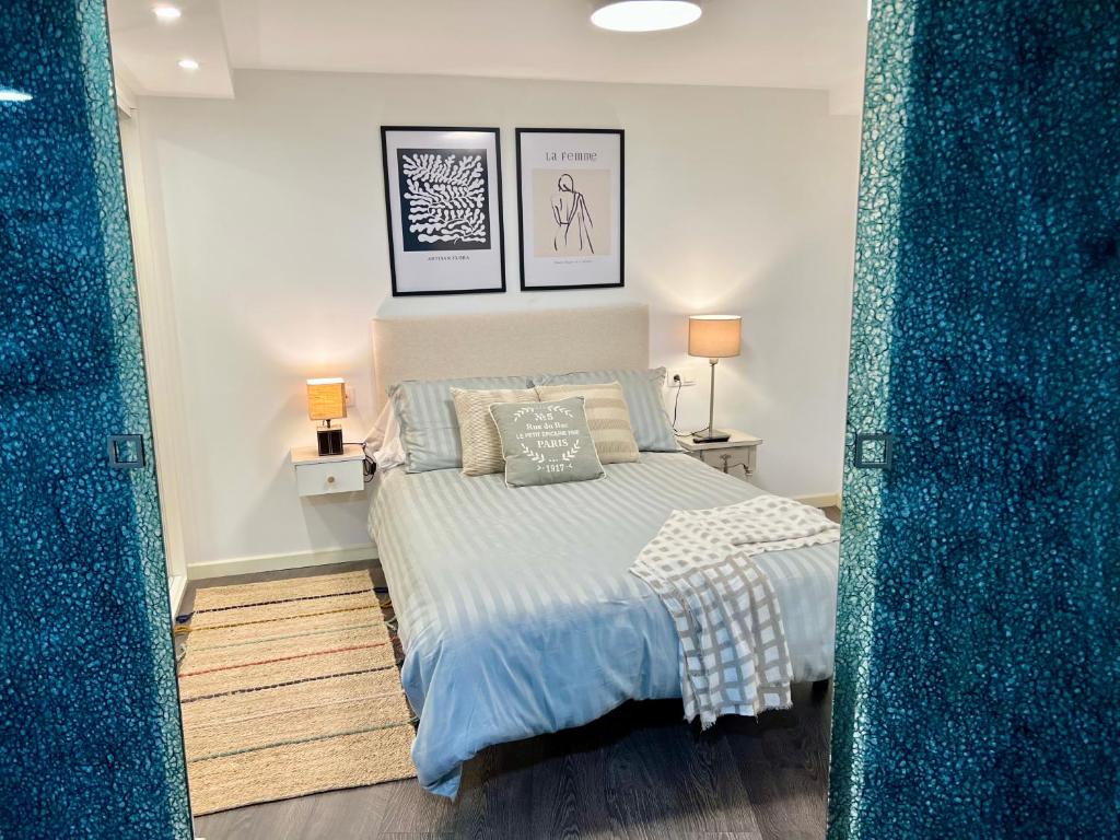 A bed or beds in a room at El patio de Lindo