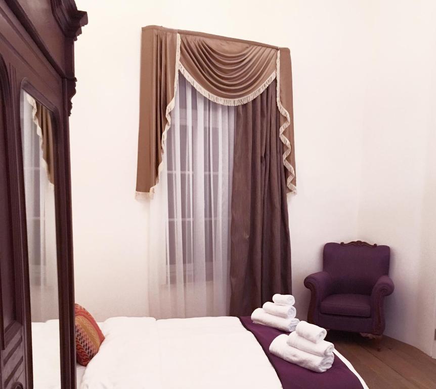 Postel nebo postele na pokoji v ubytování Lokàl Boutique Hotel