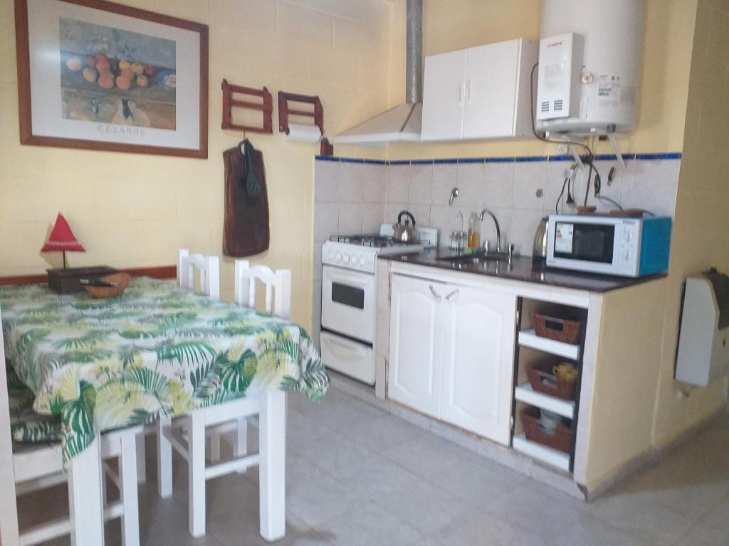 Kuchyň nebo kuchyňský kout v ubytování Cabanas Valle Azul