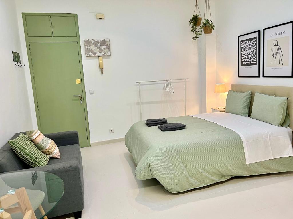 A bed or beds in a room at El patio de San Miguel