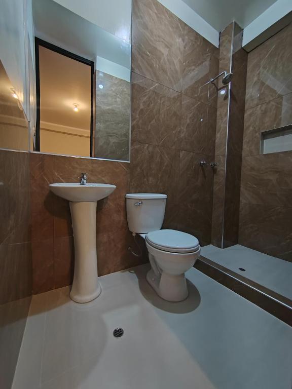 Koupelna v ubytování Hostal Bryan