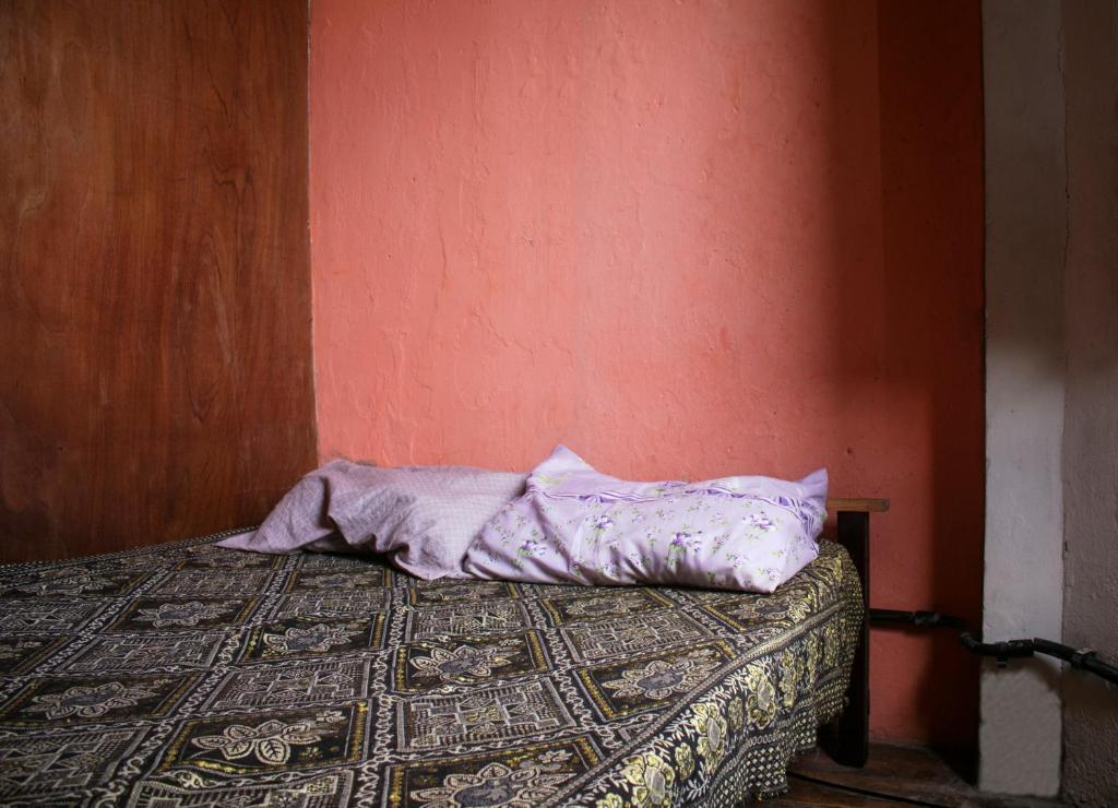 Postel nebo postele na pokoji v ubytování Fusion Guesthouse