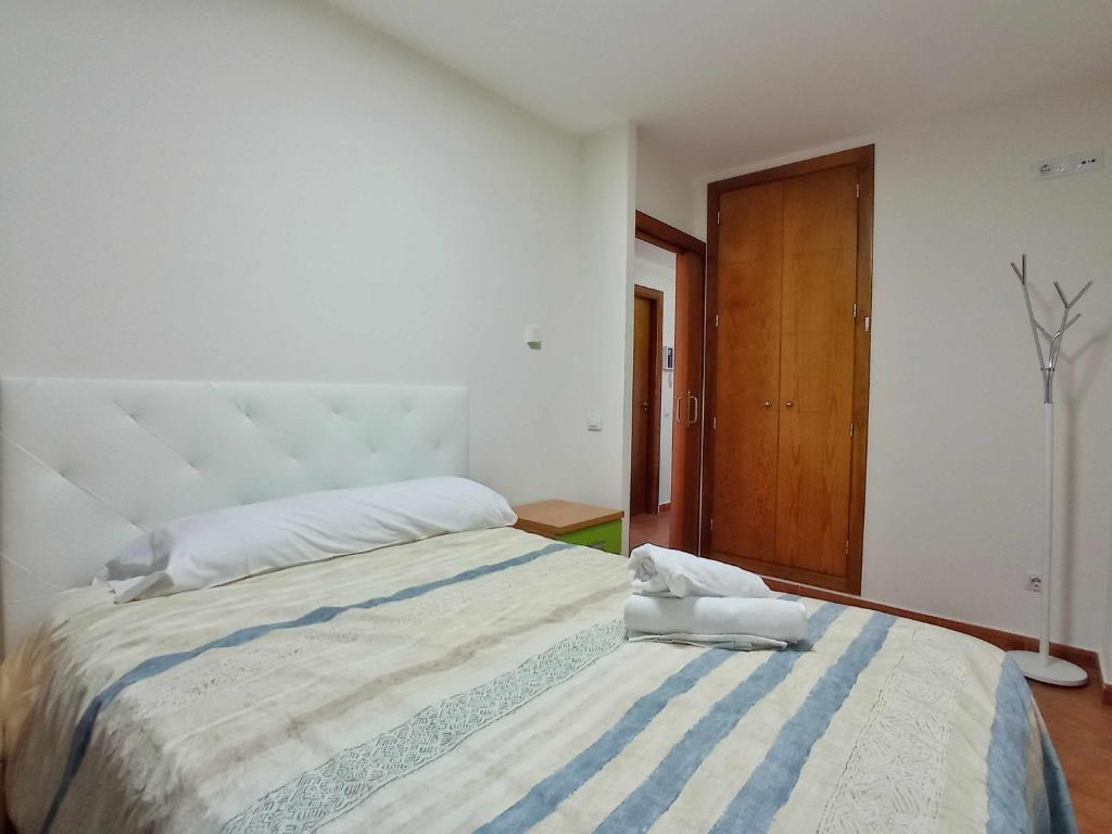 Postel nebo postele na pokoji v ubytování Apartamento familiar