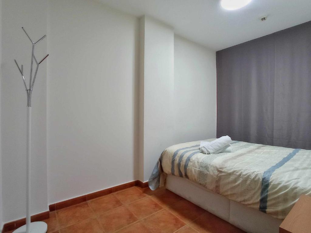 Postel nebo postele na pokoji v ubytování Apartamento familiar