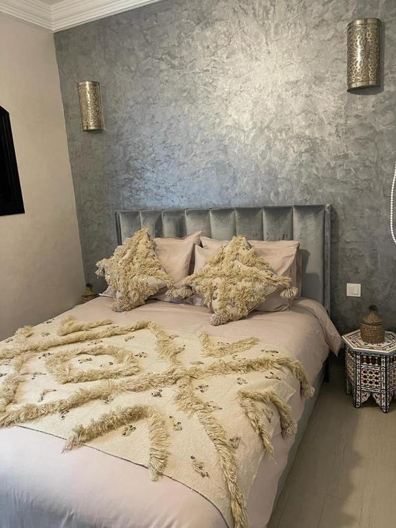 Postel nebo postele na pokoji v ubytování Riad Darnooz