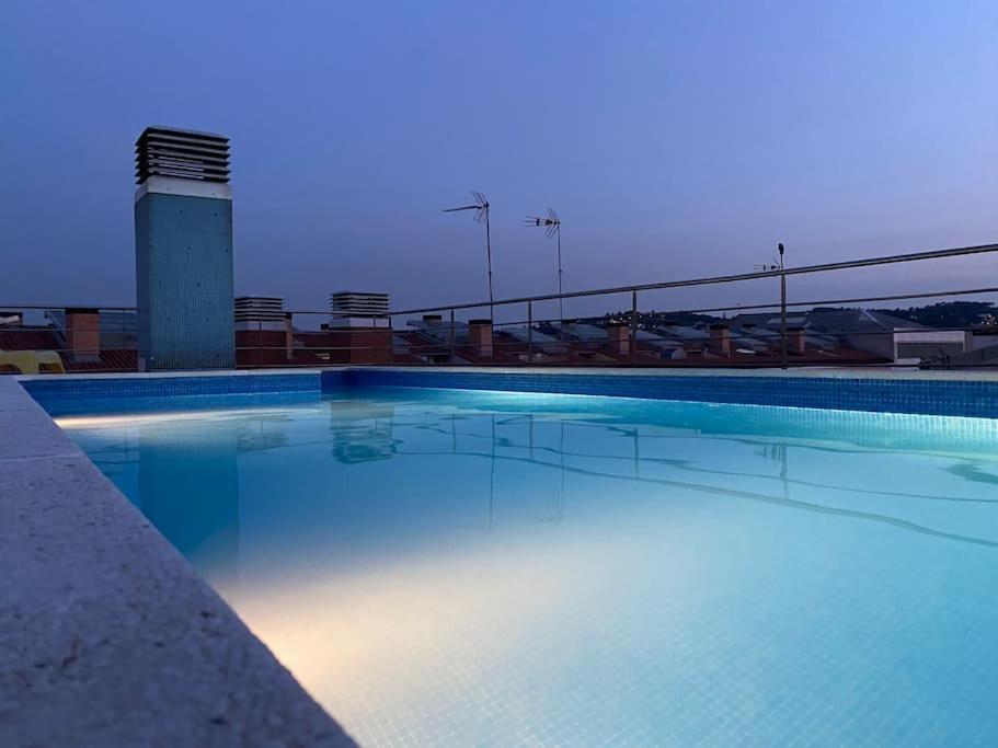 Bazén v ubytování Piscina en Centro de Terrassa nebo v jeho okolí