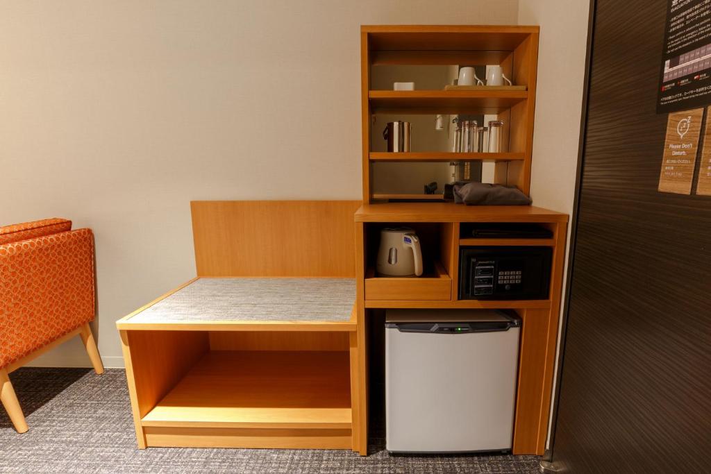 Kuchyň nebo kuchyňský kout v ubytování Keisei Hotel Miramare