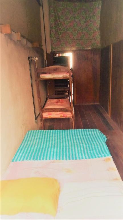 Postel nebo postele na pokoji v ubytování Fusion Guesthouse