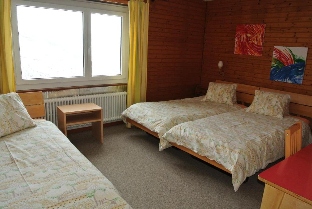 Postel nebo postele na pokoji v ubytování Fortuna