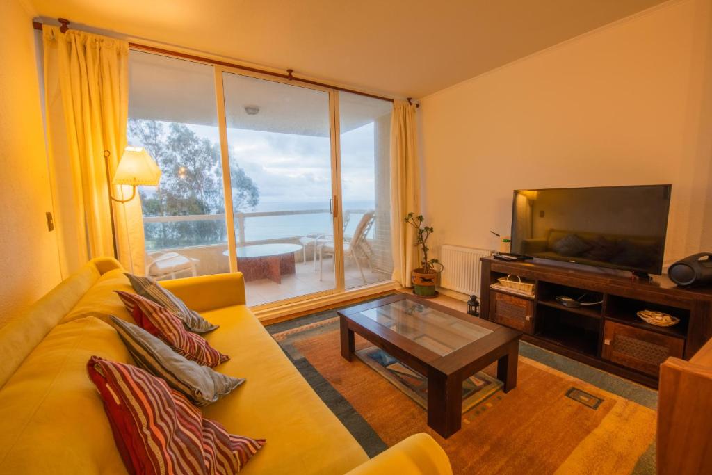 Zona de estar de Oceana Suites Costa Quilen