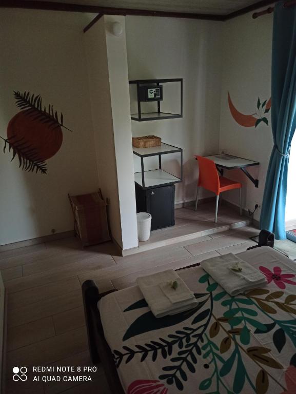 Postel nebo postele na pokoji v ubytování La Maison Du Voyage