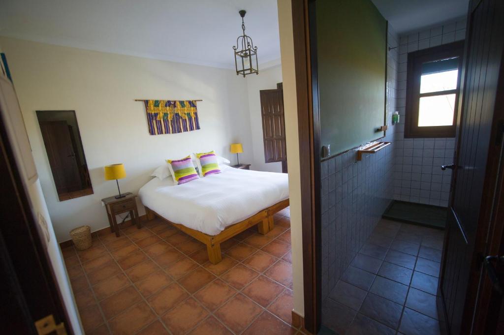 Postel nebo postele na pokoji v ubytování Casa Olea