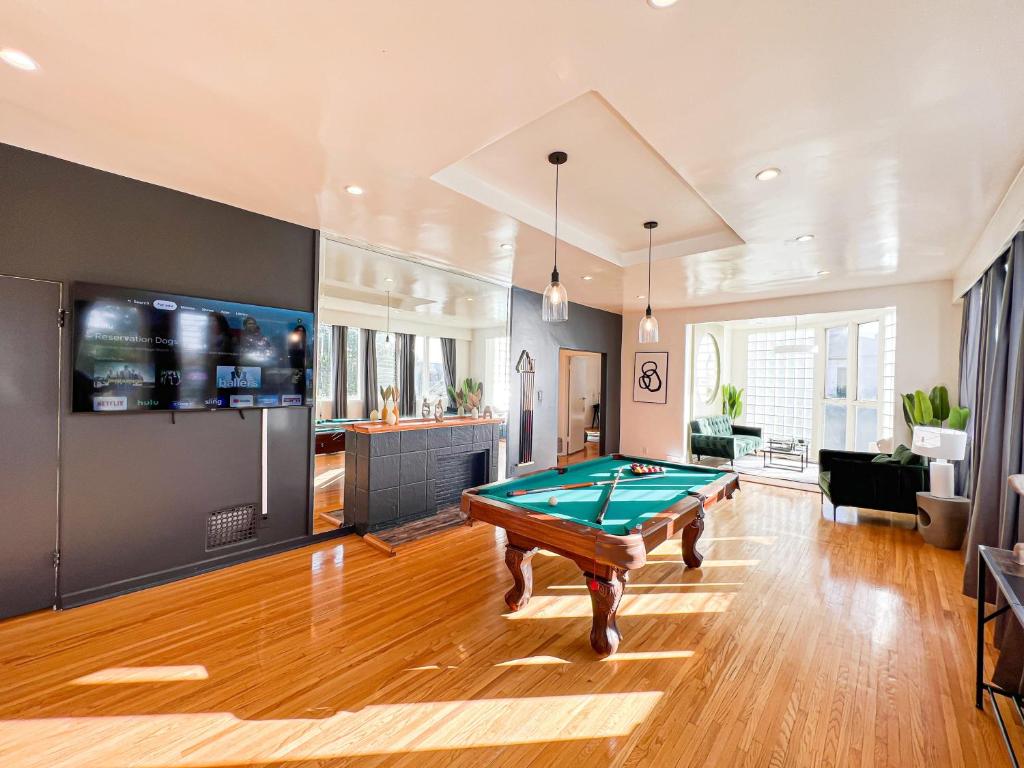 a living room with a pool table in it at Stylish Residence in Los Angeles - OL-WH in Los Angeles
