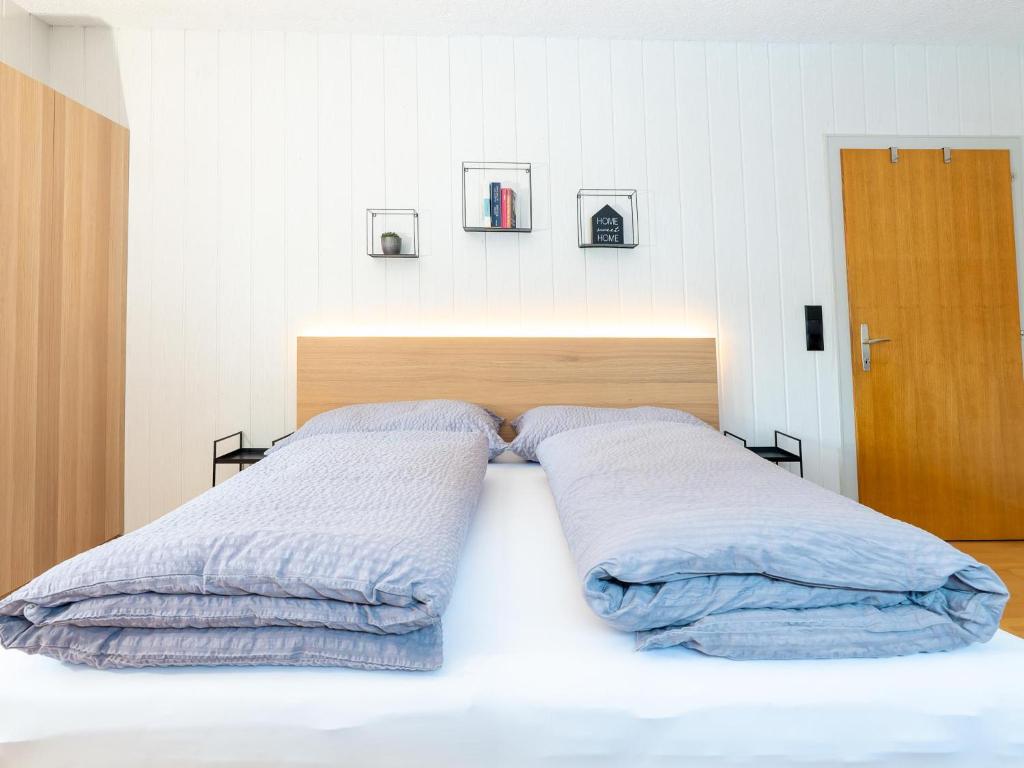 Postel nebo postele na pokoji v ubytování Haus Andrea