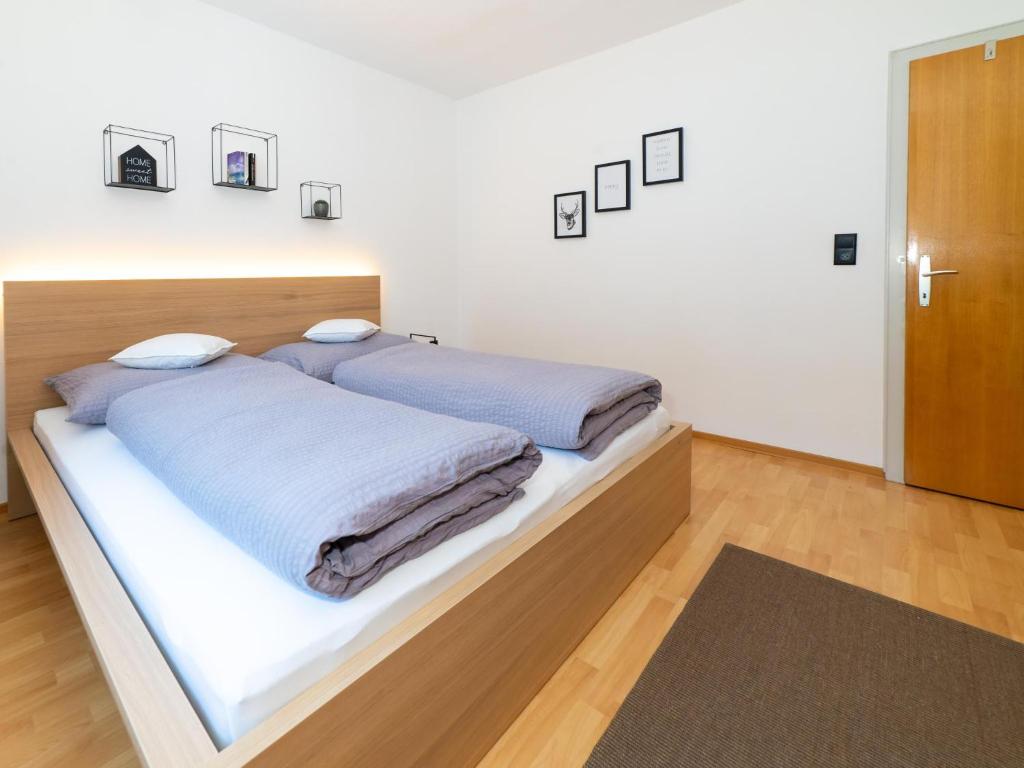 Postel nebo postele na pokoji v ubytování Haus Andrea