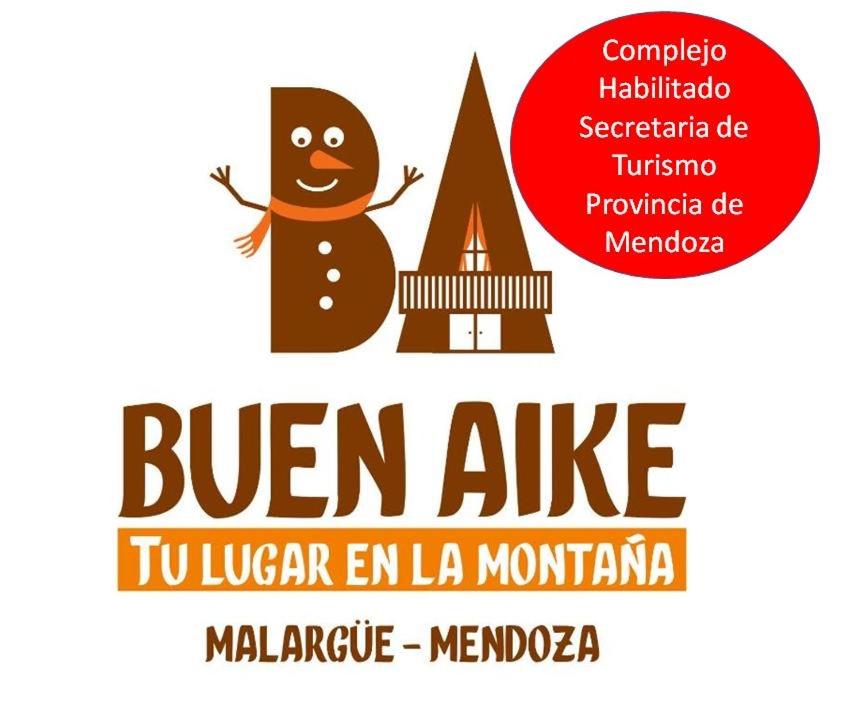 logo pour auzu en la madera dans l'établissement Cabañas Buen Aike, à Malargüe